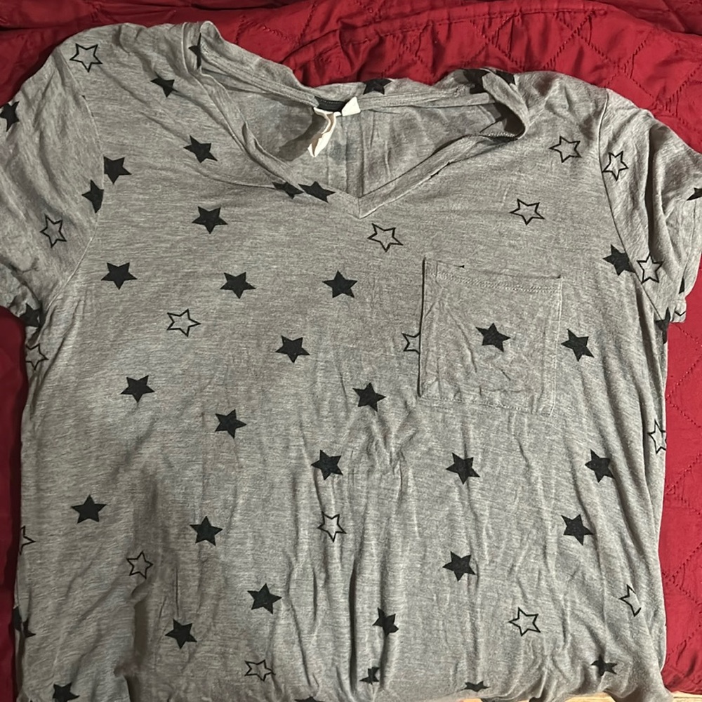 Women’s large star grey T shirt.